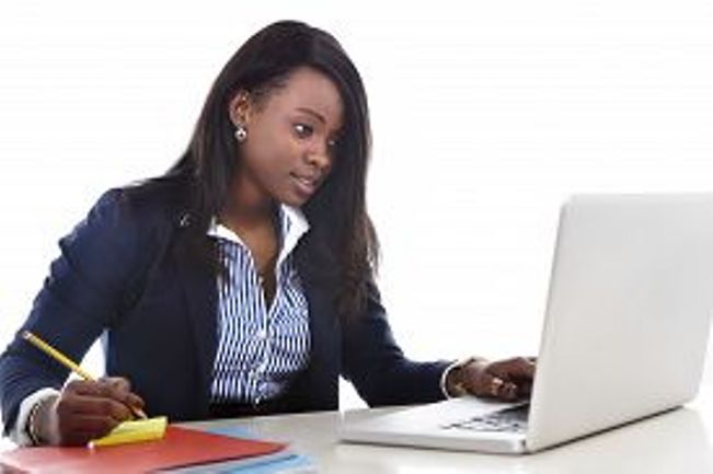 young_attractive_efficient_black_ethnicity_woman_sitting_office_cg8p3480861c_th